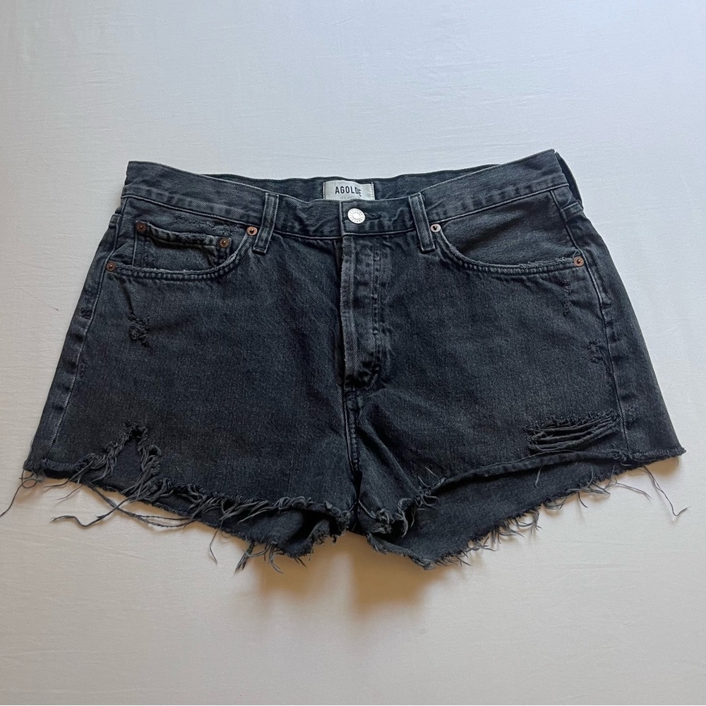 AGOLDE Parker black denim cotton distressed raw fray hem cutoff shorts